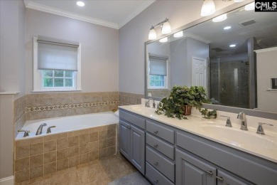 This stylish custom home with its welcoming front porch sits in on The Wildewood Country Club in South Carolina - for sale on GolfHomes.com, golf home, golf lot