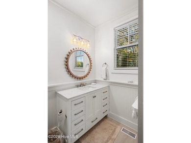 Located on a high homesite overlooking the 13th tee of the Bald on Bald Head Island Golf Club in North Carolina - for sale on GolfHomes.com, golf home, golf lot