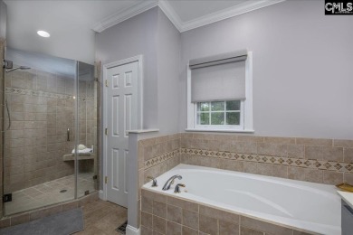 This stylish custom home with its welcoming front porch sits in on The Wildewood Country Club in South Carolina - for sale on GolfHomes.com, golf home, golf lot
