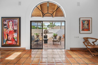 WOW! A truly one-of-a-kind California-style estate perfectly on Atlantis Golf Club in Florida - for sale on GolfHomes.com, golf home, golf lot