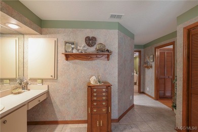 Welcome to this remarkable home in Cypress Village of Sugarmill on Sugarmill Woods Golf and Country Club in Florida - for sale on GolfHomes.com, golf home, golf lot