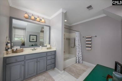 This stylish custom home with its welcoming front porch sits in on The Wildewood Country Club in South Carolina - for sale on GolfHomes.com, golf home, golf lot