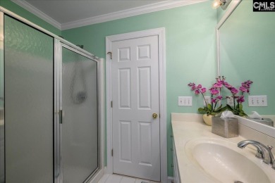 This stylish custom home with its welcoming front porch sits in on The Wildewood Country Club in South Carolina - for sale on GolfHomes.com, golf home, golf lot