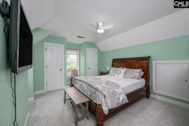 This stylish custom home with its welcoming front porch sits in on The Wildewood Country Club in South Carolina - for sale on GolfHomes.com, golf home, golf lot