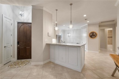 Enjoy the serenity of this spacious Capri Model Villa in the on The Classics Country Club At Lely Resort in Florida - for sale on GolfHomes.com, golf home, golf lot
