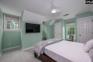 This stylish custom home with its welcoming front porch sits in on The Wildewood Country Club in South Carolina - for sale on GolfHomes.com, golf home, golf lot