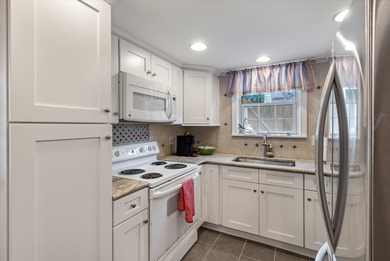 Just two blocks from the beach, this exceptional Isle of Palms on Wild Dunes Harbor Golf Resort in South Carolina - for sale on GolfHomes.com, golf home, golf lot