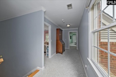This stylish custom home with its welcoming front porch sits in on The Wildewood Country Club in South Carolina - for sale on GolfHomes.com, golf home, golf lot