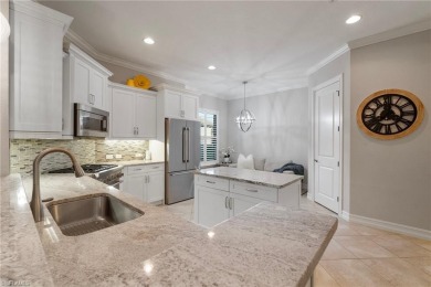 Enjoy the serenity of this spacious Capri Model Villa in the on The Classics Country Club At Lely Resort in Florida - for sale on GolfHomes.com, golf home, golf lot