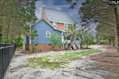 This stylish custom home with its welcoming front porch sits in on The Wildewood Country Club in South Carolina - for sale on GolfHomes.com, golf home, golf lot