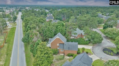 This stylish custom home with its welcoming front porch sits in on The Wildewood Country Club in South Carolina - for sale on GolfHomes.com, golf home, golf lot