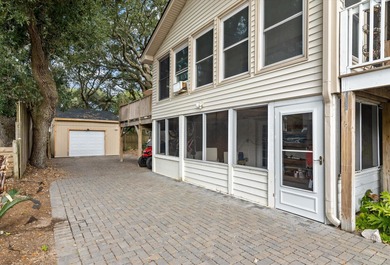 Just two blocks from the beach, this exceptional Isle of Palms on Wild Dunes Harbor Golf Resort in South Carolina - for sale on GolfHomes.com, golf home, golf lot