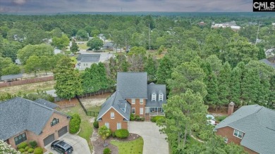 This stylish custom home with its welcoming front porch sits in on The Wildewood Country Club in South Carolina - for sale on GolfHomes.com, golf home, golf lot