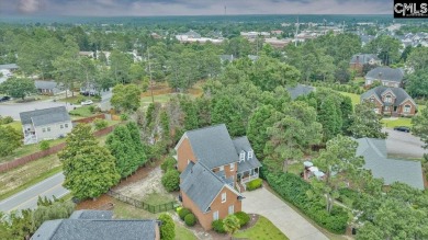 This stylish custom home with its welcoming front porch sits in on The Wildewood Country Club in South Carolina - for sale on GolfHomes.com, golf home, golf lot