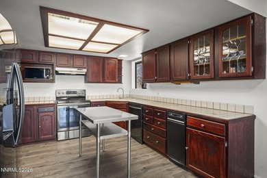 Situated on over 3 acres with easy freeway access, this property on Sierra Sage Golf Course in Nevada - for sale on GolfHomes.com, golf home, golf lot