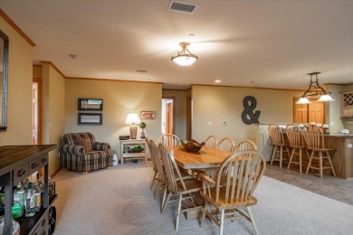 Executive style living can be yours in this Penthouse at on Northern Bay Golf Resort and Marina in Wisconsin - for sale on GolfHomes.com, golf home, golf lot