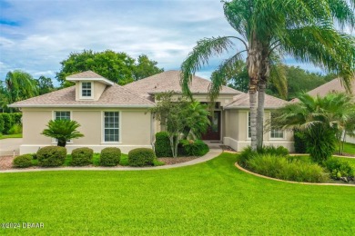 Step inside and WOW what a view!! Very well maintained, light on Halifax Plantation Golf Club in Florida - for sale on GolfHomes.com, golf home, golf lot