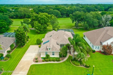 Step inside and WOW what a view!! Very well maintained, light on Halifax Plantation Golf Club in Florida - for sale on GolfHomes.com, golf home, golf lot