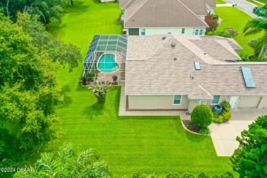 Step inside and WOW what a view!! Very well maintained, light on Halifax Plantation Golf Club in Florida - for sale on GolfHomes.com, golf home, golf lot