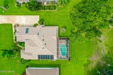 Step inside and WOW what a view!! Very well maintained, light on Halifax Plantation Golf Club in Florida - for sale on GolfHomes.com, golf home, golf lot