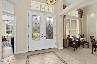 Step inside and WOW what a view!! Very well maintained, light on Halifax Plantation Golf Club in Florida - for sale on GolfHomes.com, golf home, golf lot