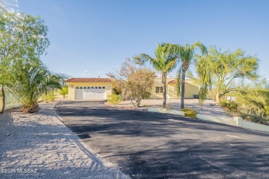 A hillside oasis in Oro Valley Estates. Nestled on a sprawling on Oro Valley Country Club in Arizona - for sale on GolfHomes.com, golf home, golf lot