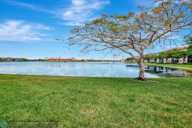 Enjoy the spectacular LAKE view from this beautiful and LARGE on Flamingo Lakes Country Club in Florida - for sale on GolfHomes.com, golf home, golf lot
