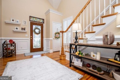 Welcome to this amazing home filled with southern charm nestled on Mirror Lake Golf Club in Georgia - for sale on GolfHomes.com, golf home, golf lot