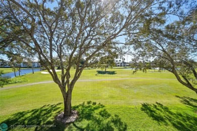 55+Step into the lap of luxury with this stunning Property in on Wynmoor Golf Course in Florida - for sale on GolfHomes.com, golf home, golf lot