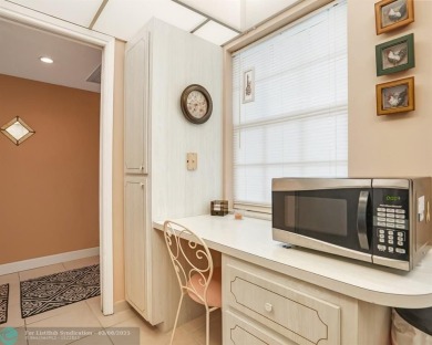 Discover your dream home in Palm Aire Country Club! This on Palm-Aire Country Club and Resort - Palms in Florida - for sale on GolfHomes.com, golf home, golf lot