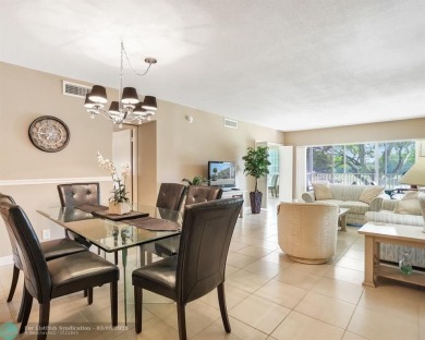 Discover your dream home in Palm Aire Country Club! This on Palm-Aire Country Club and Resort - Palms in Florida - for sale on GolfHomes.com, golf home, golf lot