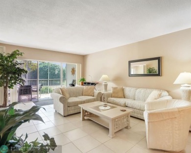 Discover your dream home in Palm Aire Country Club! This on Palm-Aire Country Club and Resort - Palms in Florida - for sale on GolfHomes.com, golf home, golf lot