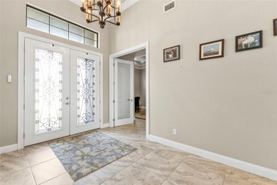 METICULOUSLY MAINTAINED and fully furnished, this stunning on Saint Andrews South Golf Club in Florida - for sale on GolfHomes.com, golf home, golf lot