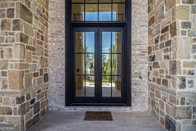 Set on a private 2.3-acre creek-lined homesite in the on Echelon Golf Club in Georgia - for sale on GolfHomes.com, golf home, golf lot