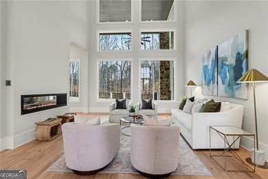 Set on a private 2.3-acre creek-lined homesite in the on Echelon Golf Club in Georgia - for sale on GolfHomes.com, golf home, golf lot