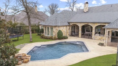 Welcome to this stunning home nestled on a spacious half-acre on Hollytree Country Club in Texas - for sale on GolfHomes.com, golf home, golf lot