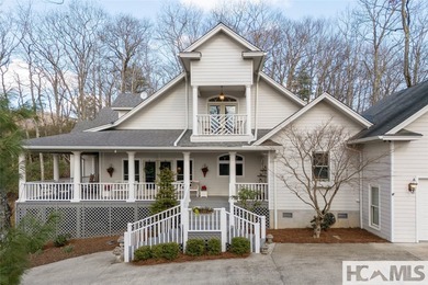 Located in the mountains of Sapphire with a wonderful mountain on Sapphire National Golf Club in North Carolina - for sale on GolfHomes.com, golf home, golf lot