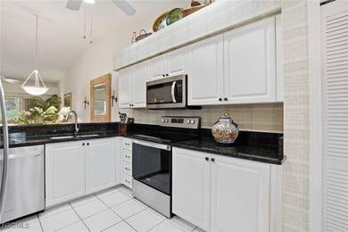 This unit is an inviting second-floor residence offering the on Olde Hickory Golf and Country Club in Florida - for sale on GolfHomes.com, golf home, golf lot