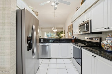 This unit is an inviting second-floor residence offering the on Olde Hickory Golf and Country Club in Florida - for sale on GolfHomes.com, golf home, golf lot