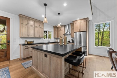 Nestled within the private, gated confines of Chinquapin, a 2 on Natures Walk At Chinquapin in North Carolina - for sale on GolfHomes.com, golf home, golf lot