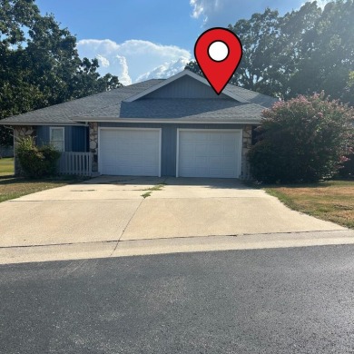 Wake up to golf course views in this 2-bedroom, 2-bath duplex on Pointe Royale Village Country Club in Missouri - for sale on GolfHomes.com, golf home, golf lot