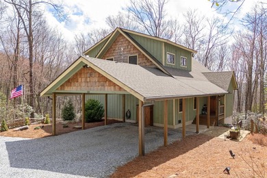 Step inside and feel the warmth of this beautifully crafted on Sapphire National Golf Club in North Carolina - for sale on GolfHomes.com, golf home, golf lot