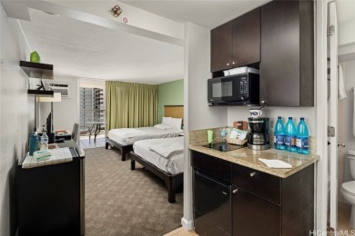 Furnished studio with 2 beds and kitchenette, large lanai with on Ala Wai Golf Course in Hawaii - for sale on GolfHomes.com, golf home, golf lot