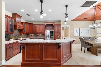 Elegant Pool Home in Glen Eagle in Winter Springs. Situated on a on Tuscawilla Country Club in Florida - for sale on GolfHomes.com, golf home, golf lot