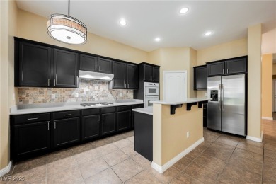 Live a Luxury Lifestyle in Tudor Park at Queensridge. Step into on Badlands Golf Club in Nevada - for sale on GolfHomes.com, golf home, golf lot