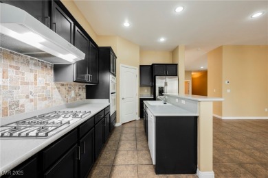Live a Luxury Lifestyle in Tudor Park at Queensridge. Step into on Badlands Golf Club in Nevada - for sale on GolfHomes.com, golf home, golf lot