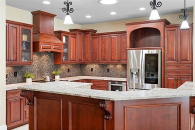 Elegant Pool Home in Glen Eagle in Winter Springs. Situated on a on Tuscawilla Country Club in Florida - for sale on GolfHomes.com, golf home, golf lot