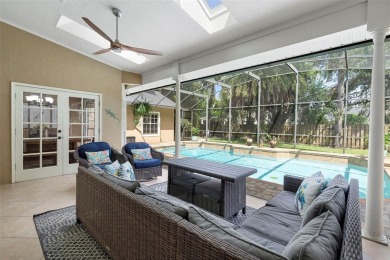 Elegant Pool Home in Glen Eagle in Winter Springs. Situated on a on Tuscawilla Country Club in Florida - for sale on GolfHomes.com, golf home, golf lot