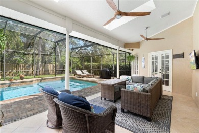 Elegant Pool Home in Glen Eagle in Winter Springs. Situated on a on Tuscawilla Country Club in Florida - for sale on GolfHomes.com, golf home, golf lot