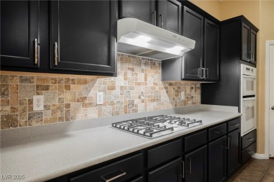Live a Luxury Lifestyle in Tudor Park at Queensridge. Step into on Badlands Golf Club in Nevada - for sale on GolfHomes.com, golf home, golf lot
